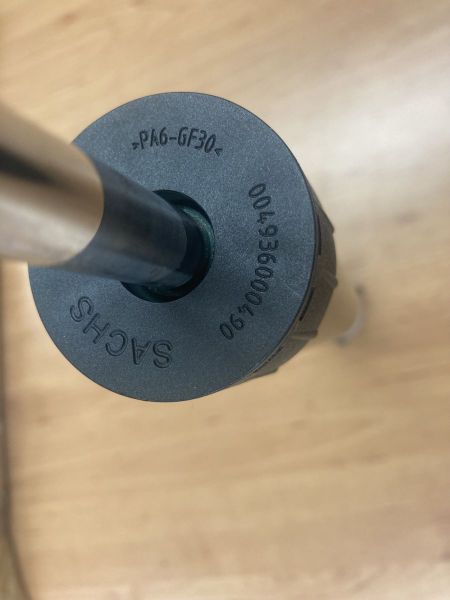 Tlumič plynokapalinový pro vozidla se sportovním podvozkem